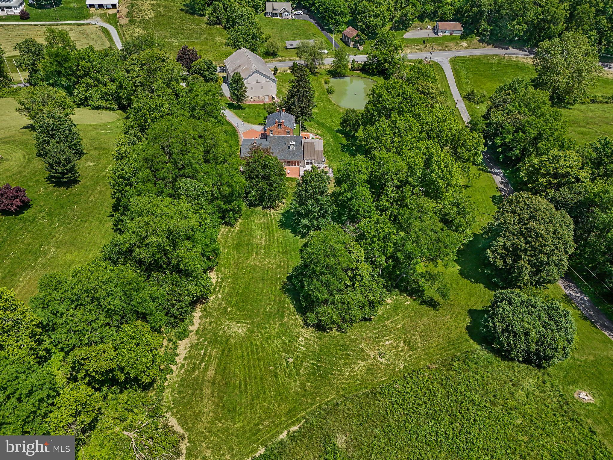 154 Calvary Church Road Wrightsville, PA 17368 - Photo 5 of 89 an aerial view of residential houses with outdoor space and trees
