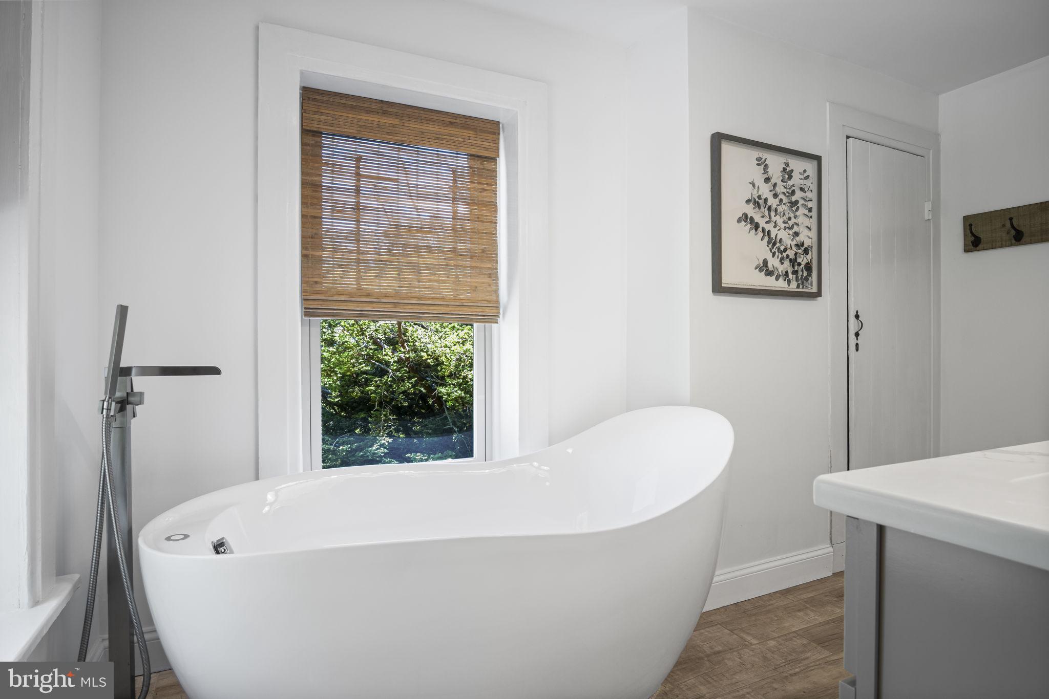 154 Calvary Church Road Wrightsville, PA 17368 - Photo 68 of 89 a white bath tub sitting next to a window
