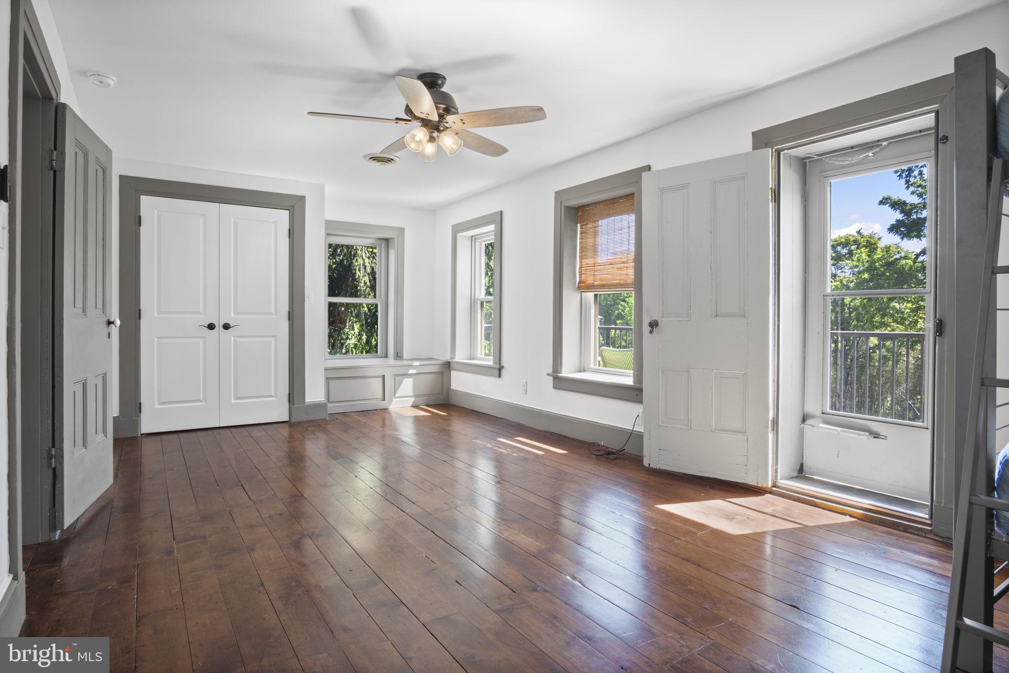 154 Calvary Church Road Wrightsville, PA 17368 - Photo 71 of 89 a view of an empty room with wooden floor and a window