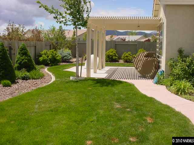 1130 Broadview Court Reno, NV 89521 - Photo 2 of 6 a view of a house with a garden
