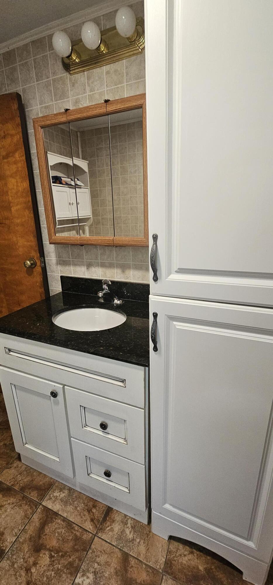 11102 82nd Street Pleasant Prairie, WI 53158 - Photo 14 of 43 Linen Closet & Vanity