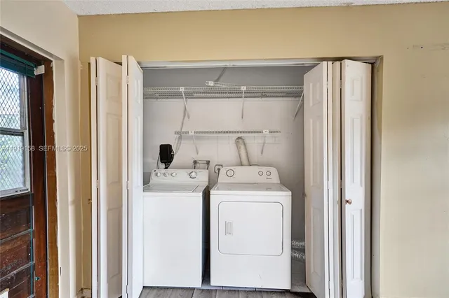 a view of a chairs in front of a house