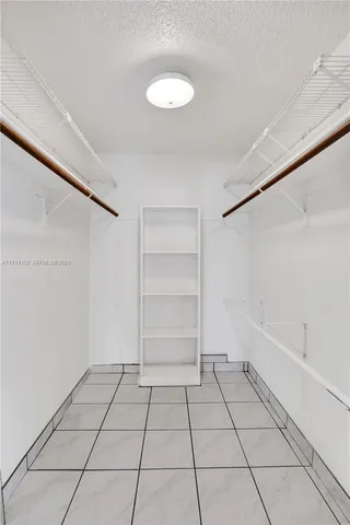 a view of workspace with furniture and window