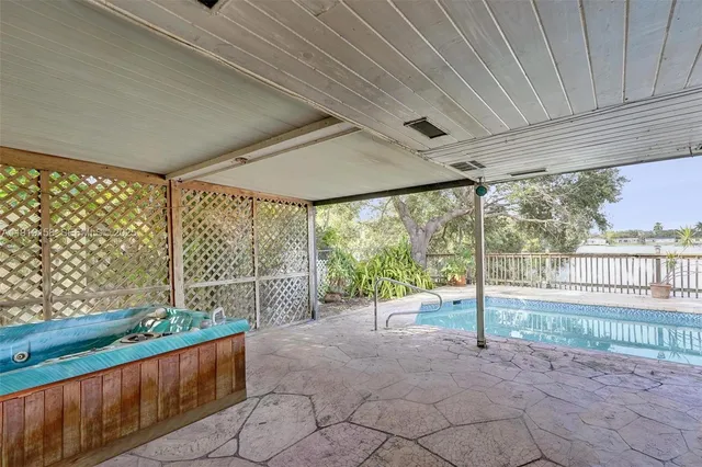 a view of a lake with a building in the background