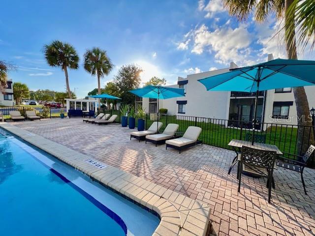1108 Bartow Road, Unit D37 Lakeland, FL 33801 - Photo 13 of 16 a view of a house with backyard and sitting area