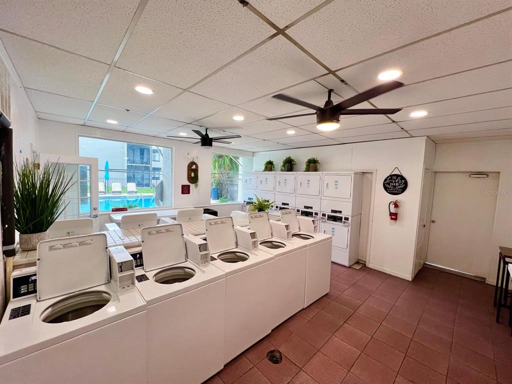 1108 Bartow Road, Unit D37 Lakeland, FL 33801 - Photo 14 of 16 a living room with furniture and a large window
