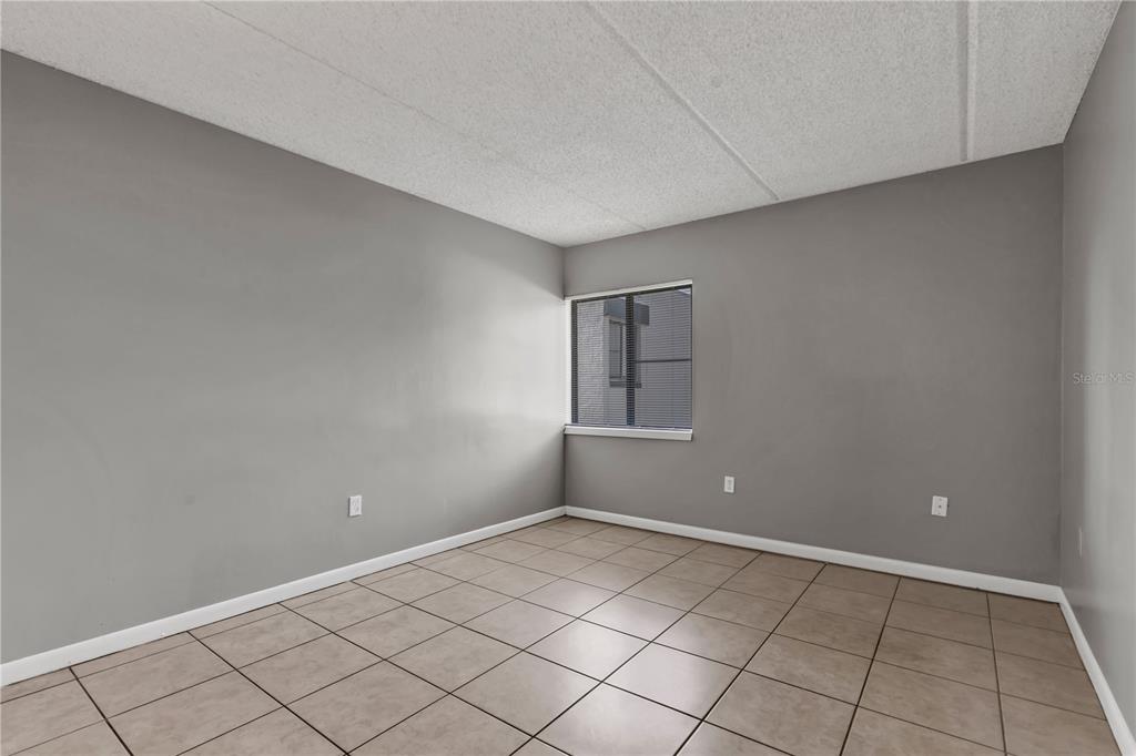 1108 Bartow Road, Unit D37 Lakeland, FL 33801 - Photo 10 of 16 a view of an empty room and window
