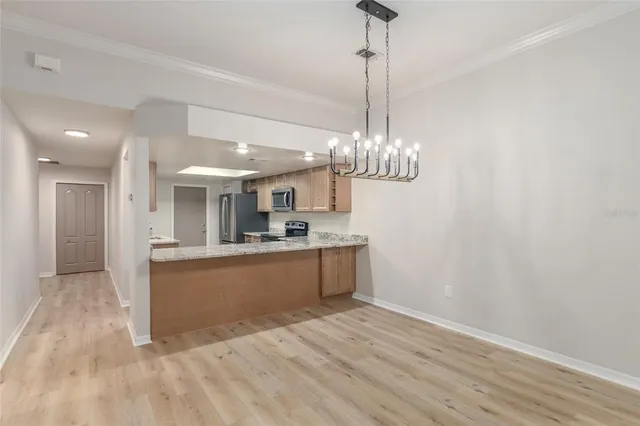 a bathroom that has a glass shower door