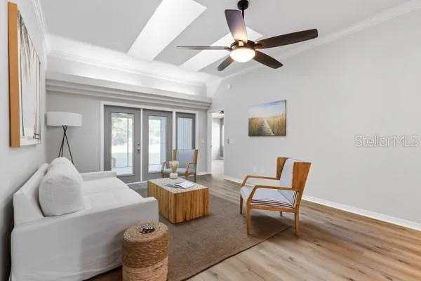 a living room with furniture and a window