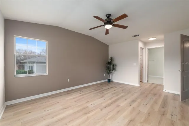 a house view with a backyard space
