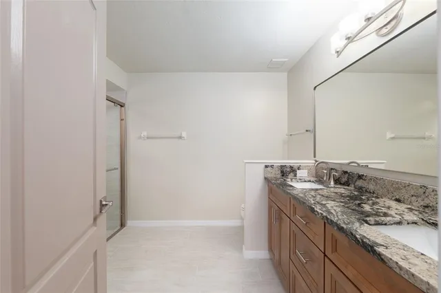 a view of a city with mountains in the background