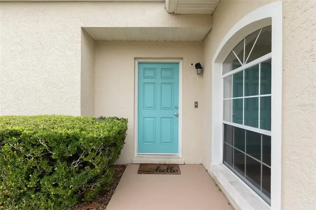 a bedroom with furniture and a wooden floor