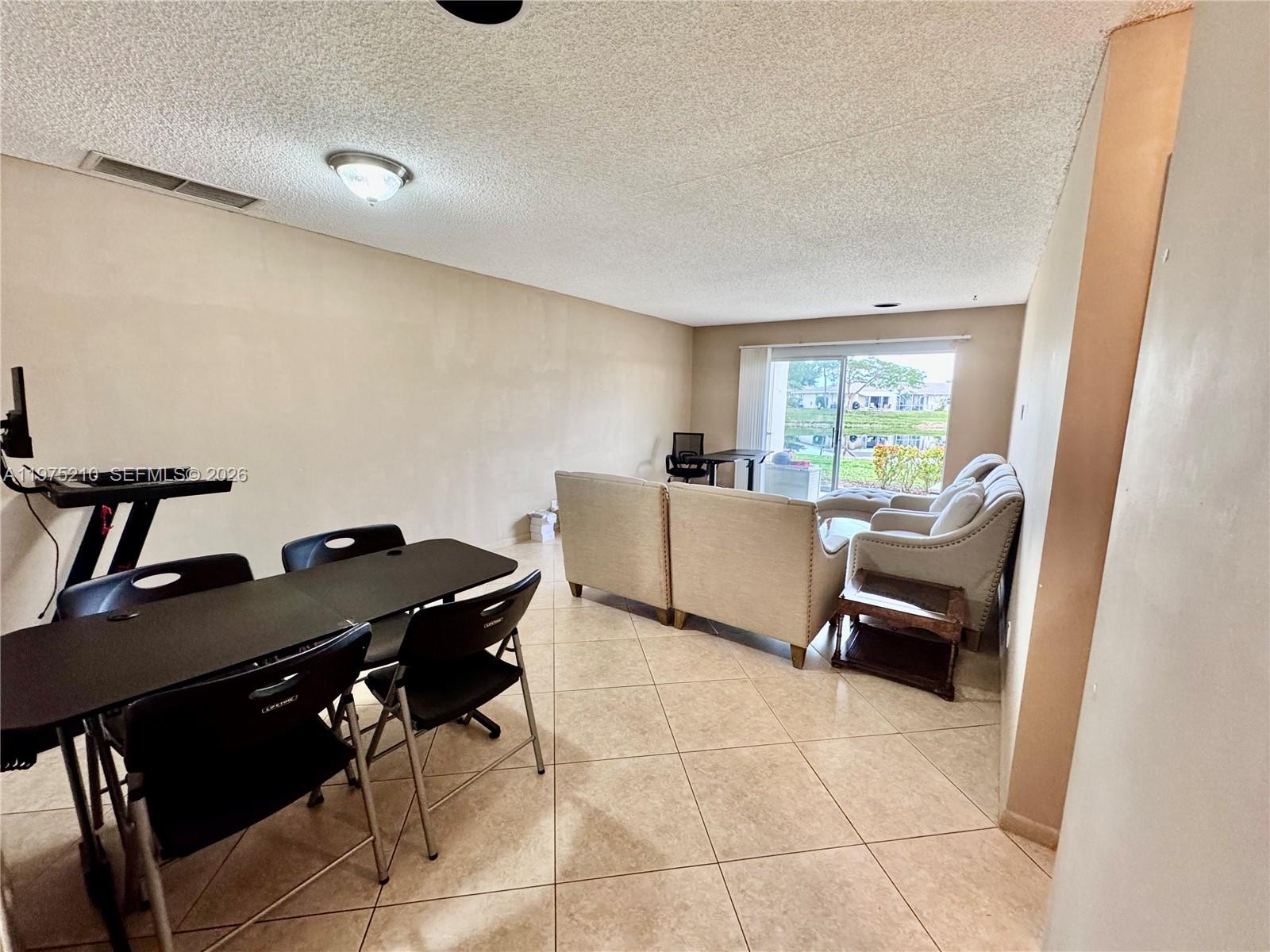 8838 Bella Vista Drive Boca Raton, FL 33433 - Photo 5 of 11 a living room with furniture