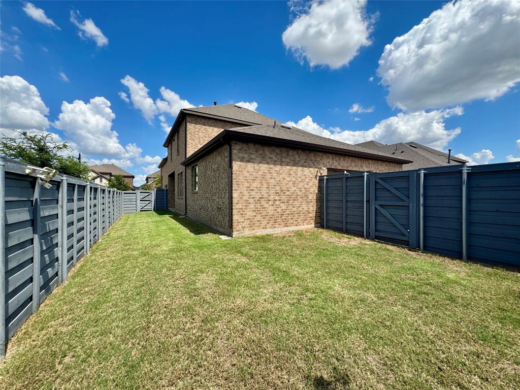 7216 Wildflower Way Little Elm, TX 76227 - Photo 21 of 22 a view of a backyard
