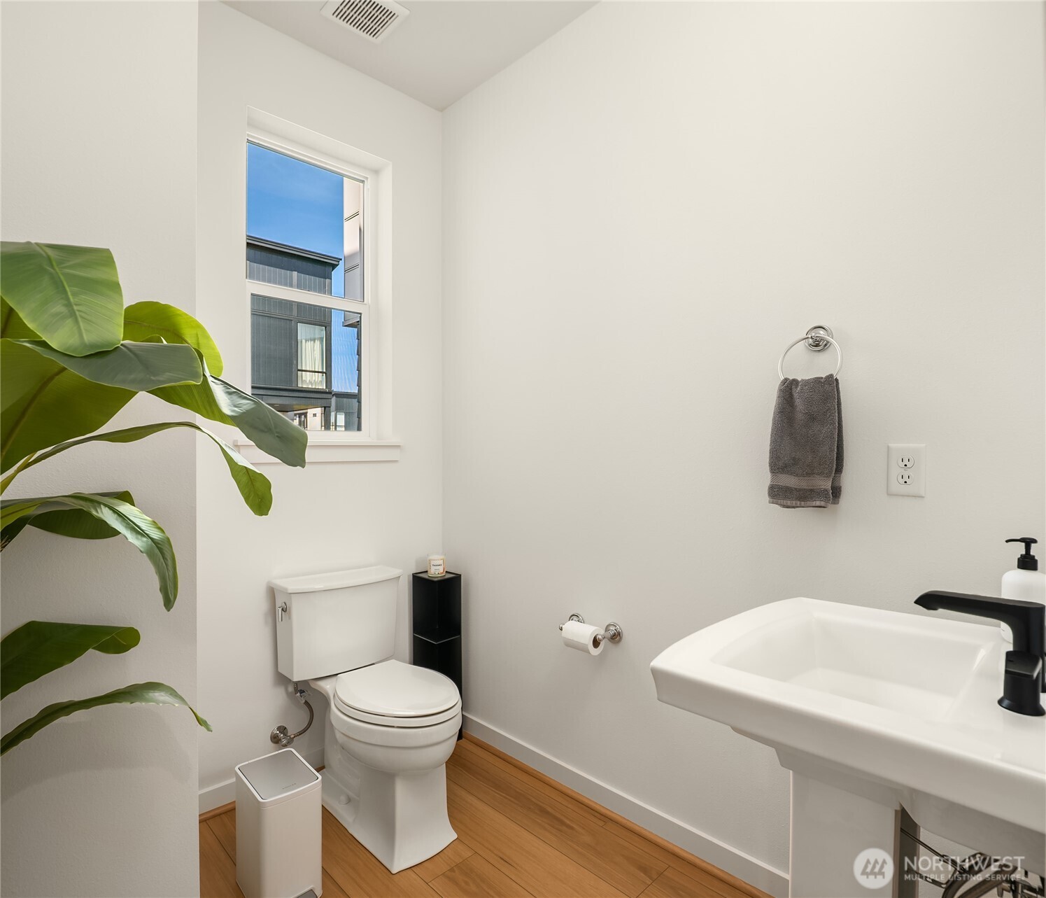 21907 25th Avenue Southeast, Unit C Bothell, WA 98021 - Photo 24 of 40 a white toilet sitting next to a bathroom sink