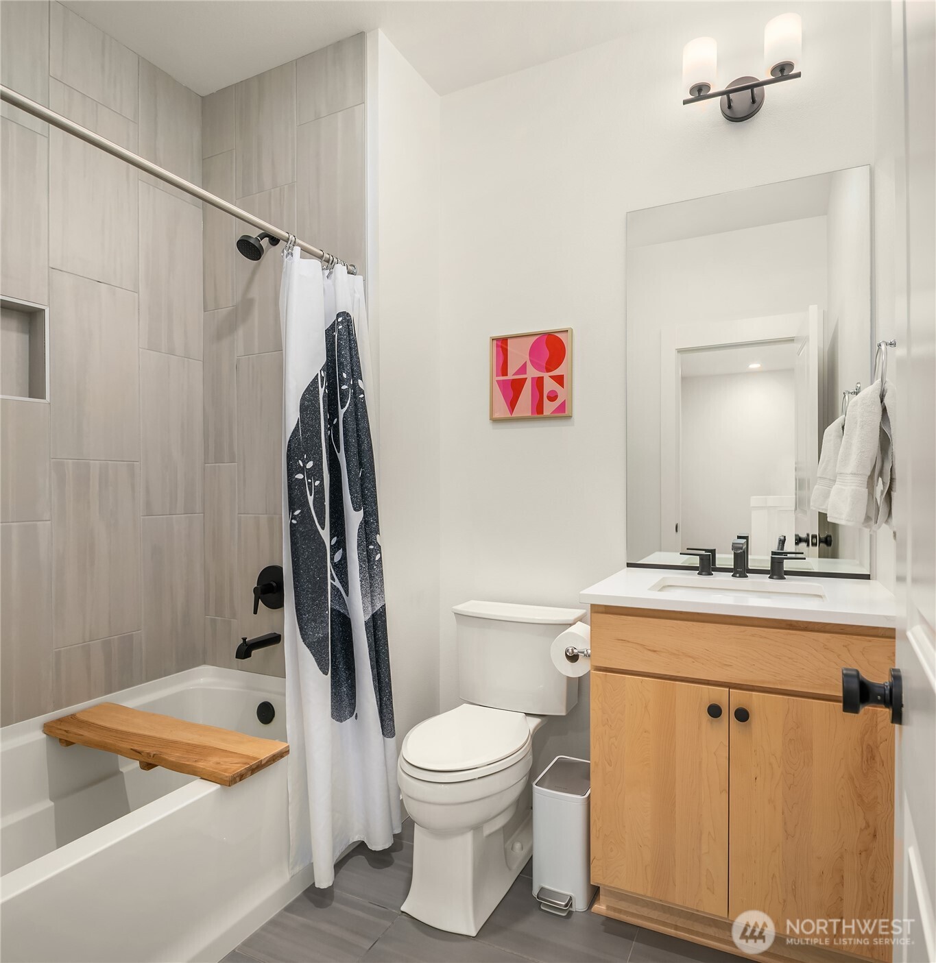 21907 25th Avenue Southeast, Unit C Bothell, WA 98021 - Photo 34 of 40 a bathroom with a sink a toilet and a bathtub
