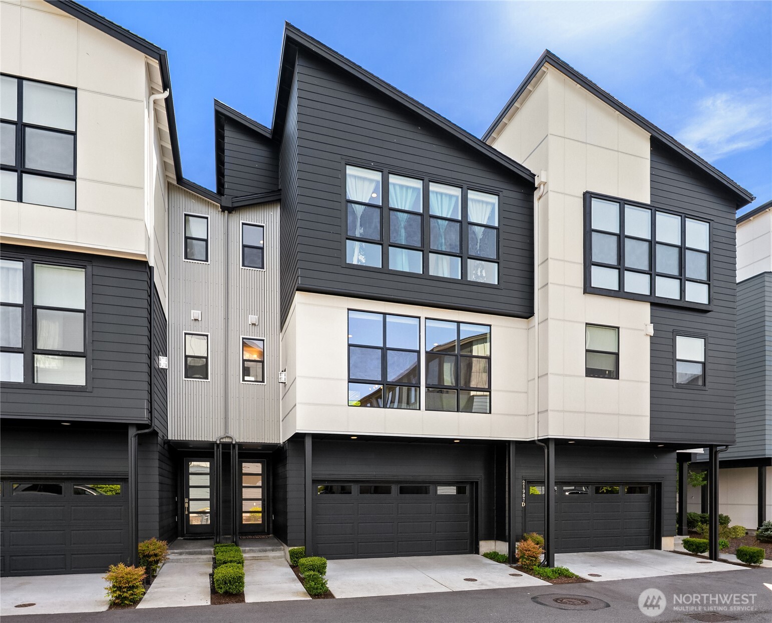 21907 25th Avenue Southeast, Unit C Bothell, WA 98021 - Photo 38 of 40 a front view of a building with glass windows