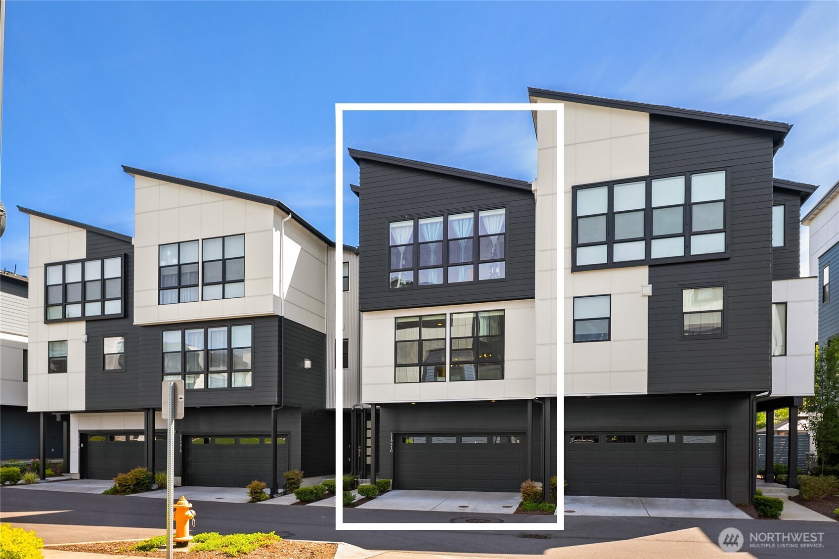 21907 25th Avenue Southeast, Unit C Bothell, WA 98021 - Photo 40 of 40 a front view of a building with street