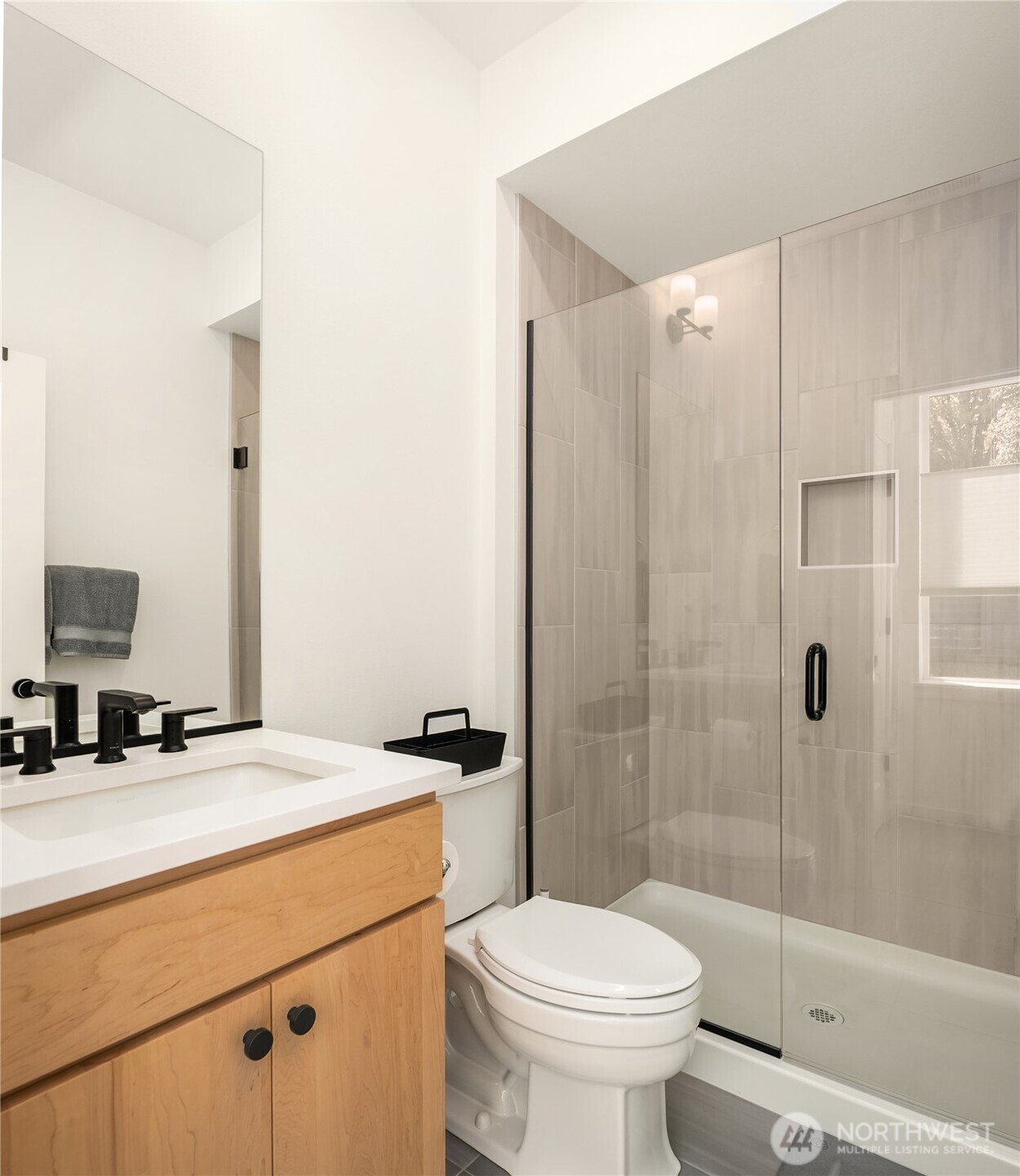21907 25th Avenue Southeast, Unit C Bothell, WA 98021 - Photo 7 of 40 a bathroom with a sink toilet and shower
