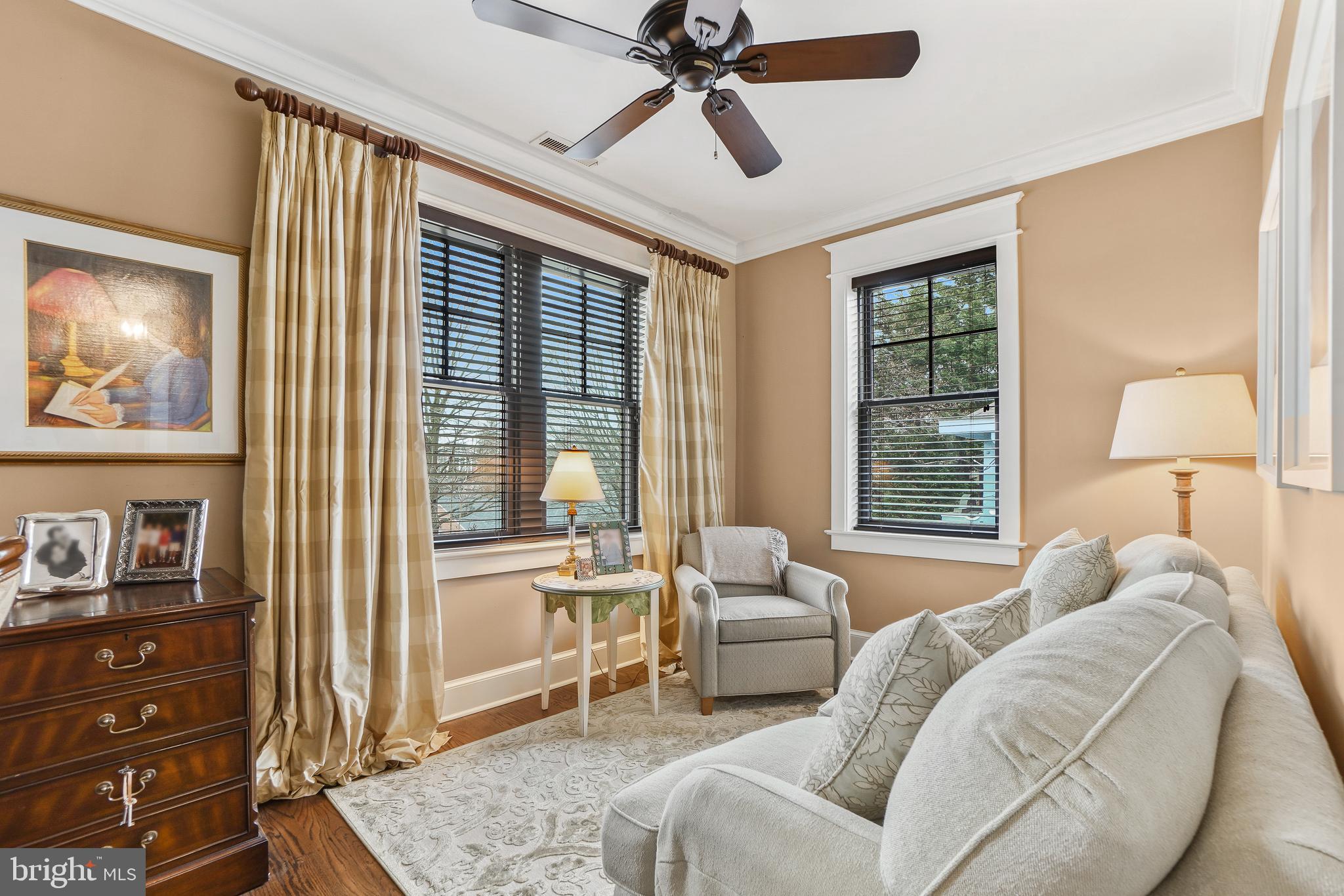 4201 Military Road Northwest Washington, DC 20015 - Photo 23 of 49 a bedroom with a bed and a chandelier