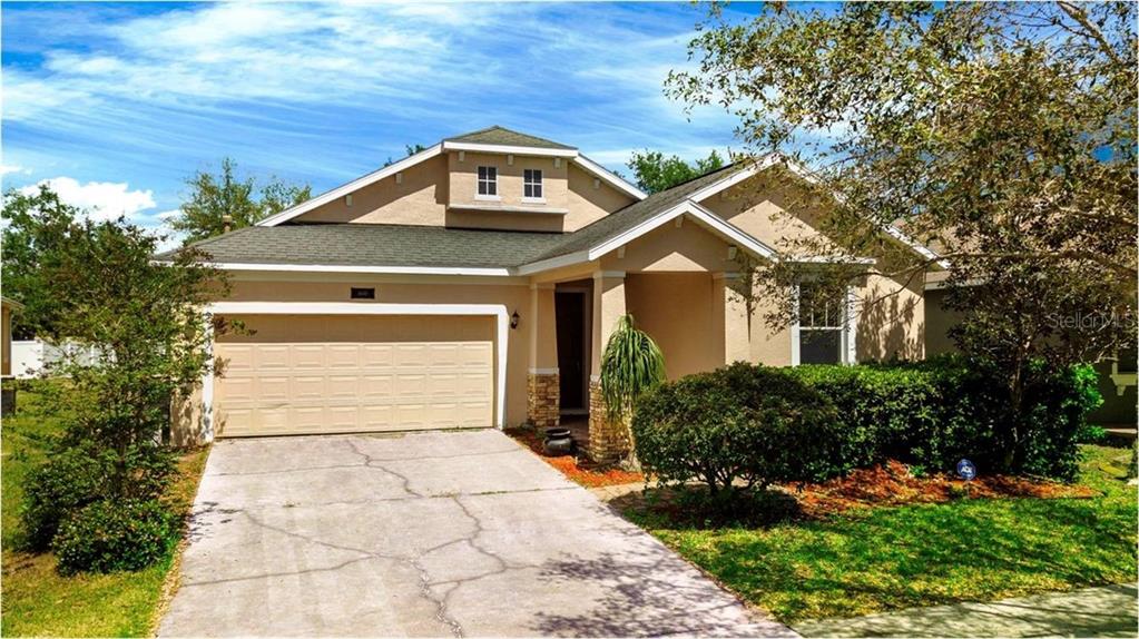 4649 Indian Deer Road Windermere, FL 34786 - Photo 1 of 1 a front view of a house with a yard