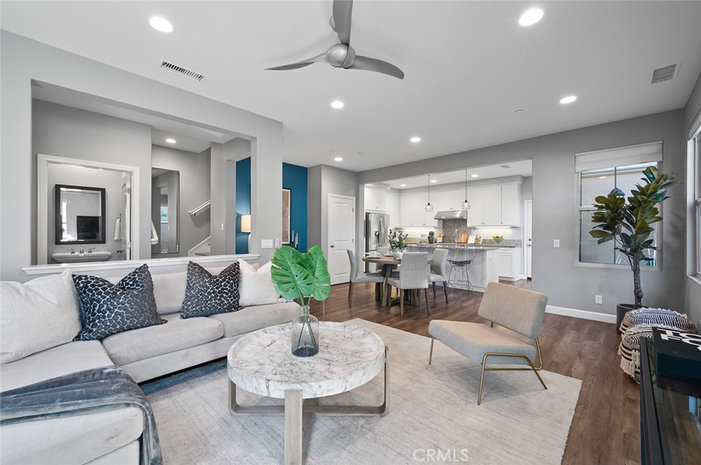 84 Granite Path Irvine, CA 92620 - Photo 2 of 55 a living room with furniture and a large window