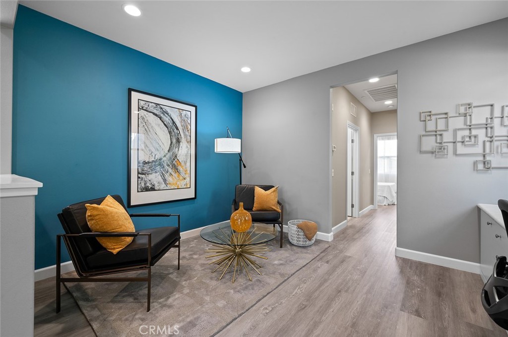 84 Granite Path Irvine, CA 92620 - Photo 21 of 55 a living room with furniture and wooden floor