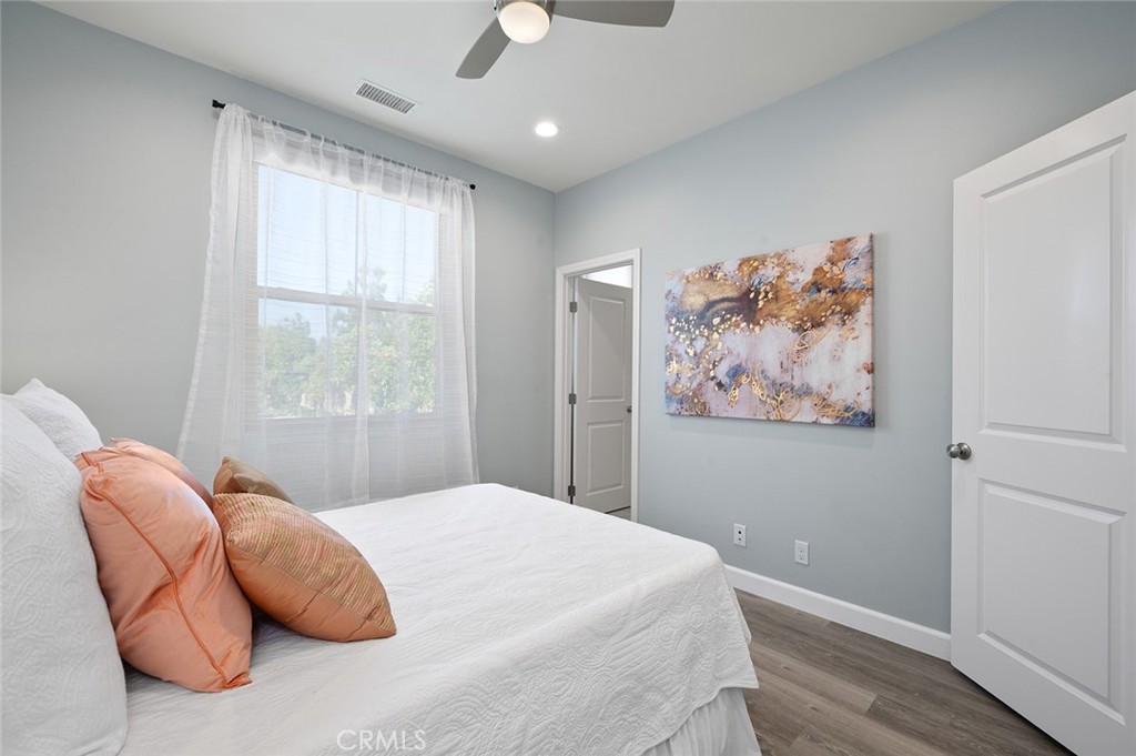84 Granite Path Irvine, CA 92620 - Photo 35 of 55 a bedroom with a bed and a window