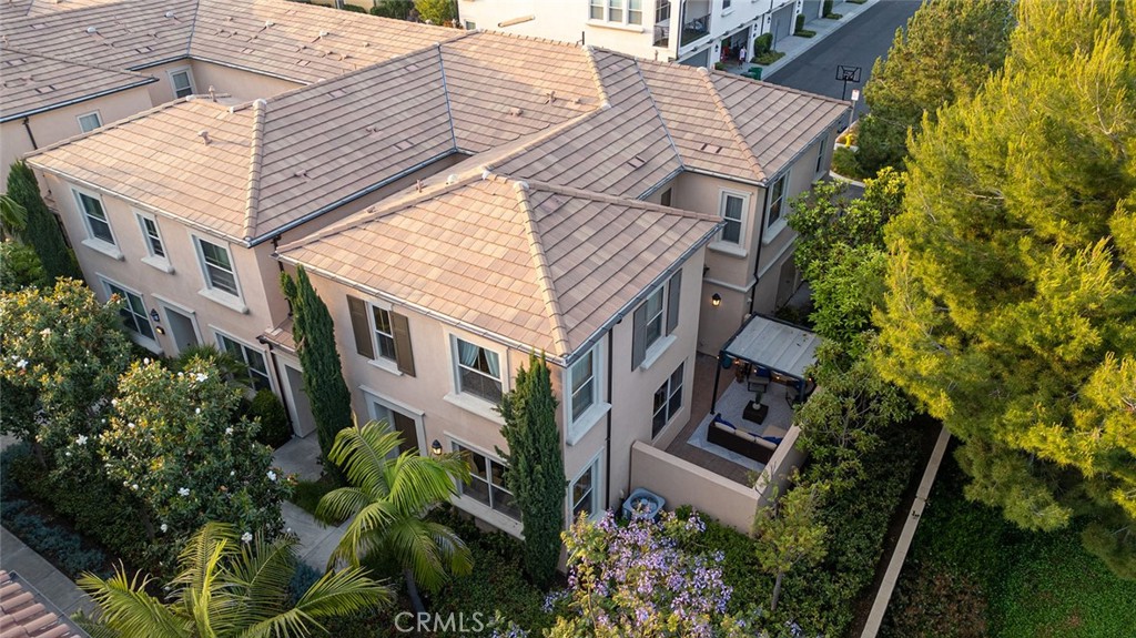 84 Granite Path Irvine, CA 92620 - Photo 53 of 55 a aerial view of a house with plants and trees