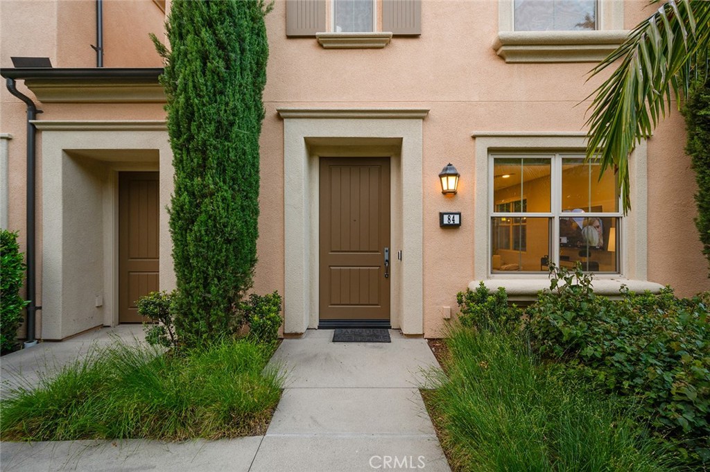 84 Granite Path Irvine, CA 92620 - Photo 7 of 55 front view of the house with potted plants