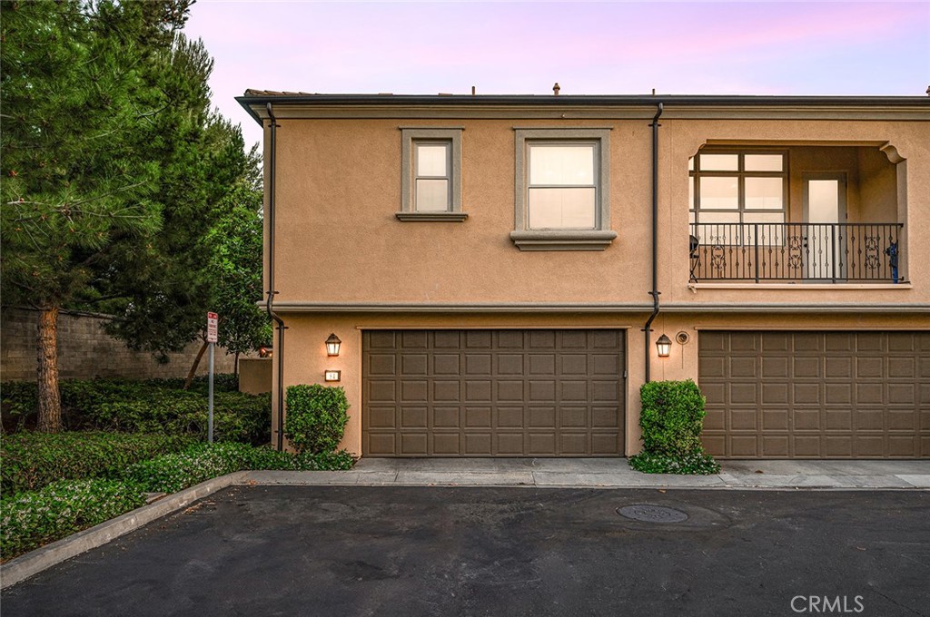 84 Granite Path Irvine, CA 92620 - Photo 9 of 55 a front view of a house