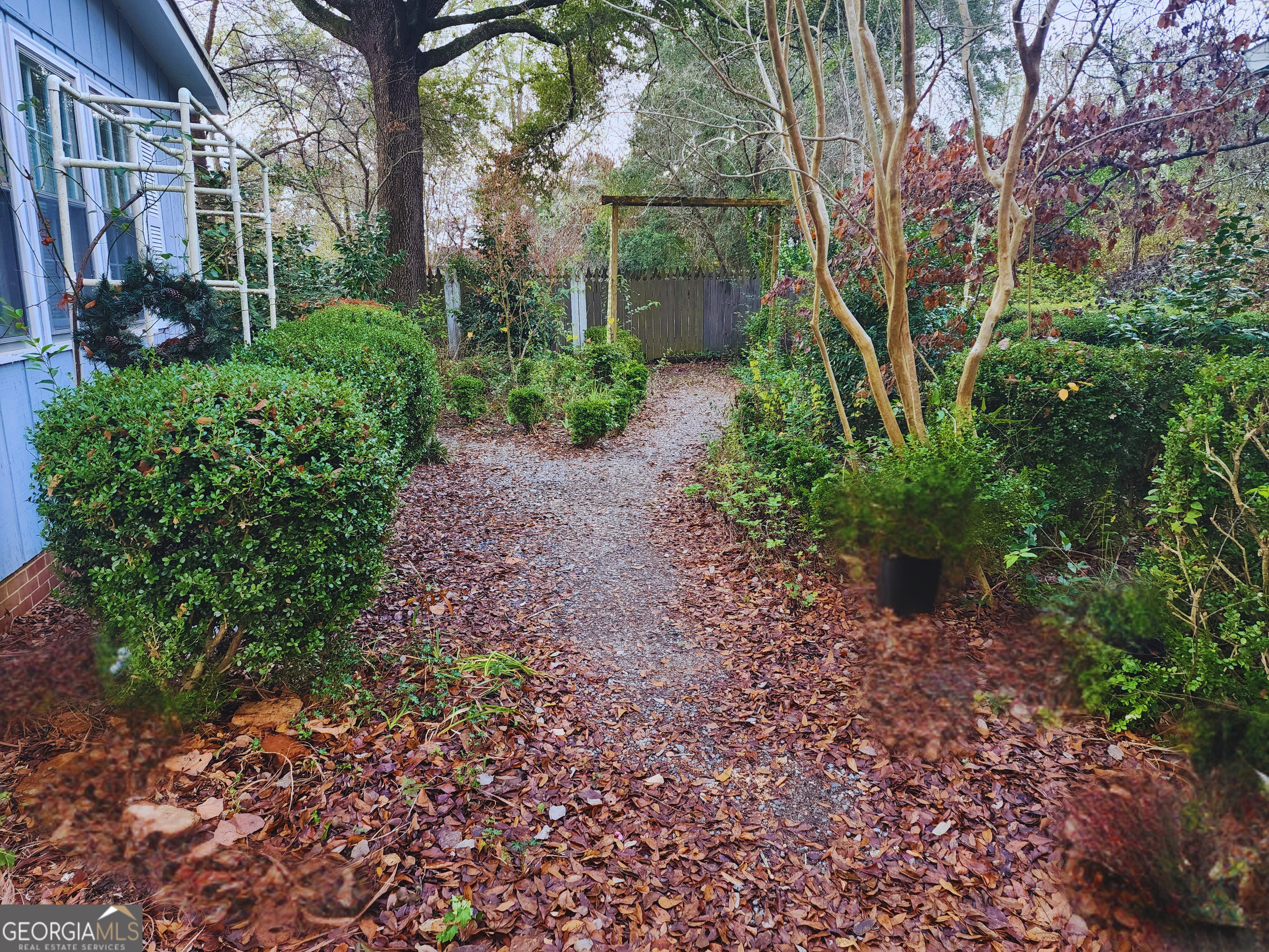 210 Penn Avenue Dublin, GA 31021 - Photo 3 of 17 a view of backyard with green space