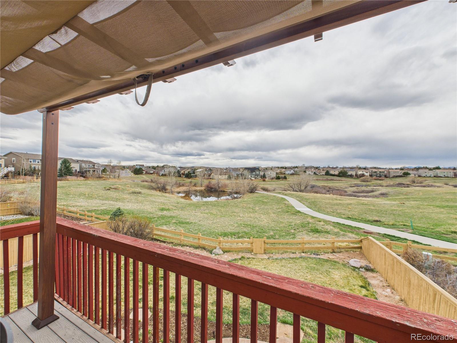 10501 Wagon Highlands Ranch Highlands Ranch, CO 80130 - Photo 41 of 50 a view of ocean from a balcony