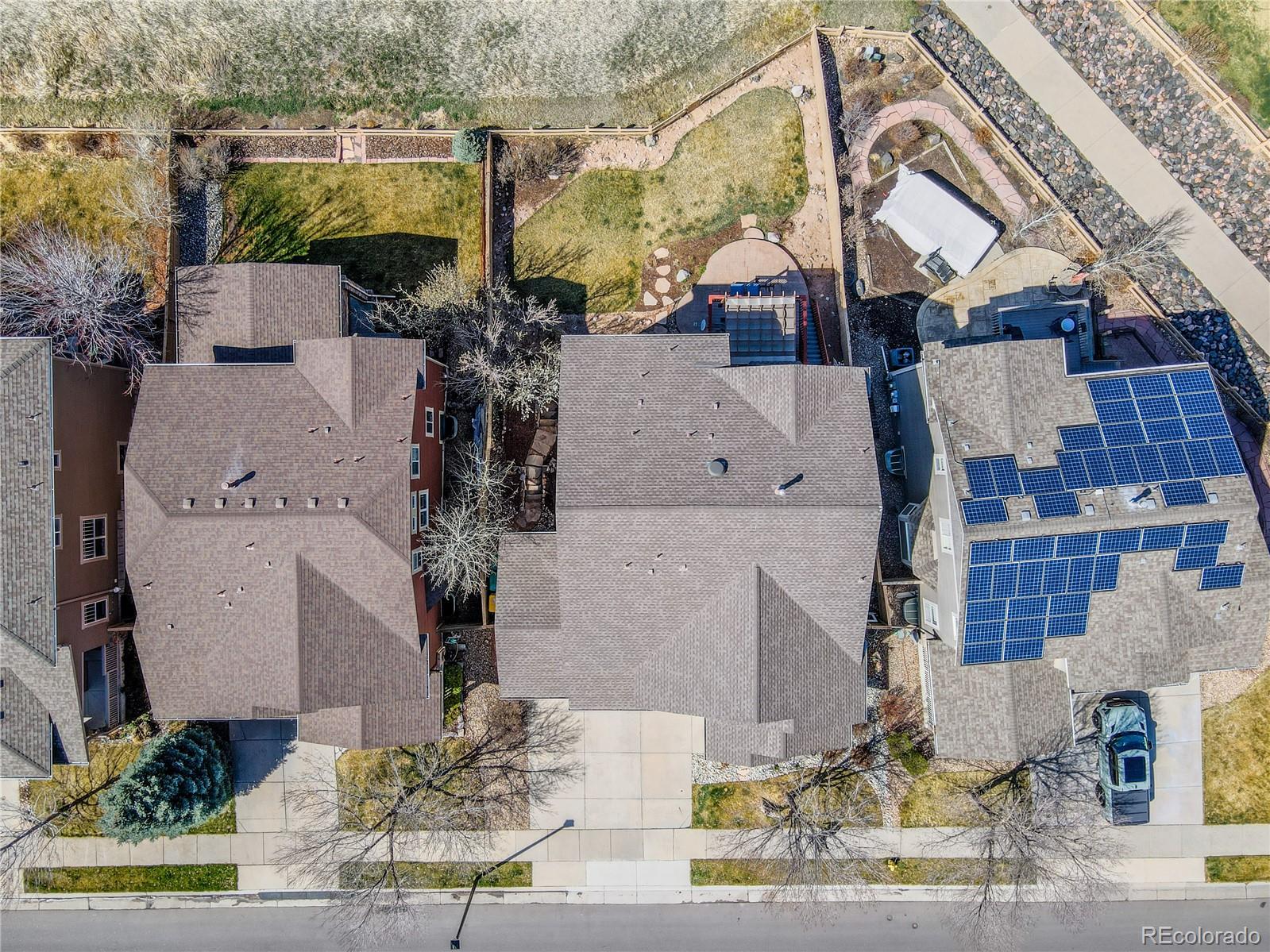 10501 Wagon Highlands Ranch Highlands Ranch, CO 80130 - Photo 48 of 50 front view of a house with a street
