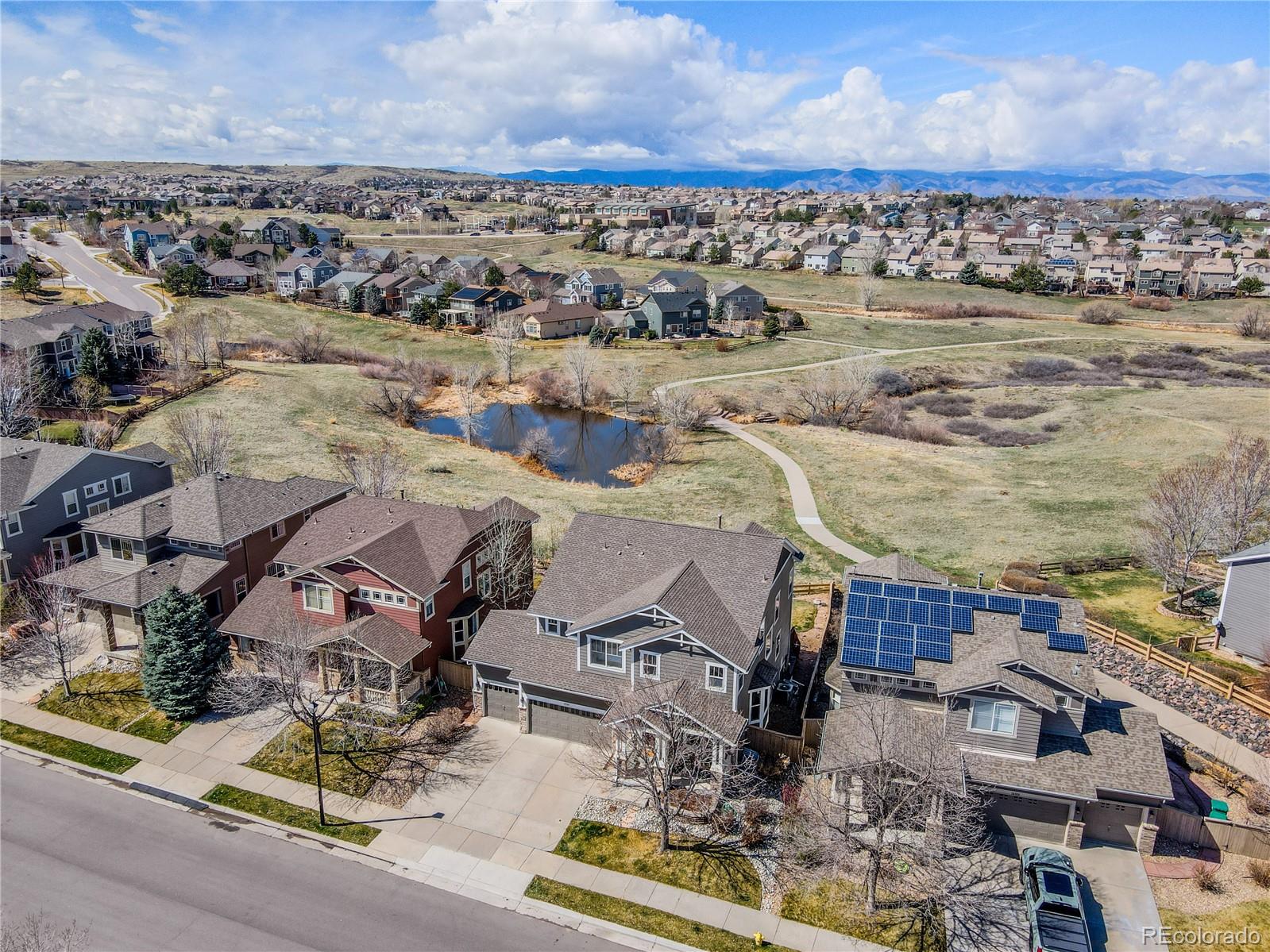 10501 Wagon Highlands Ranch Highlands Ranch, CO 80130 - Photo 50 of 50 an aerial view of residential houses with outdoor space