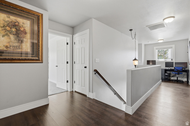1652 West 800 South Lehi, UT 84043 - Photo 24 of 27 Hallway featuring an upstairs landing, a desk, and dark wood finished floors