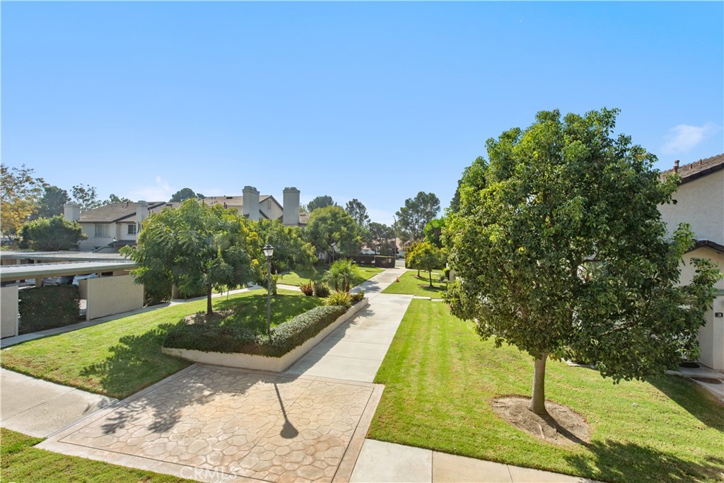 28 Exeter, Unit 19 Irvine, CA 92612 - Photo 3 of 35 a view of a yard in front of the house
