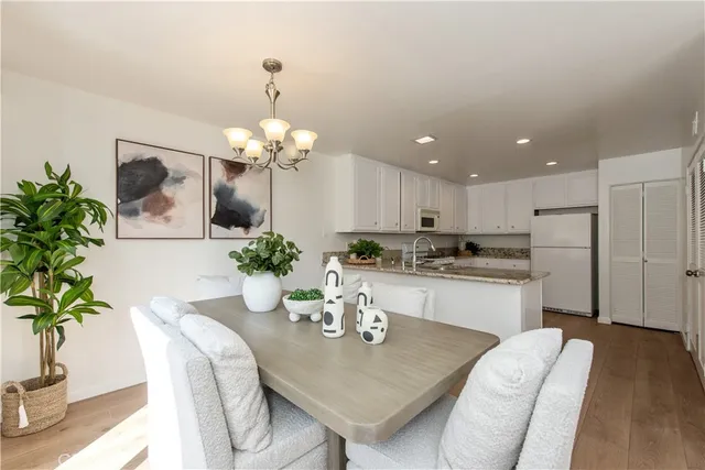 a kitchen with a table and chairs