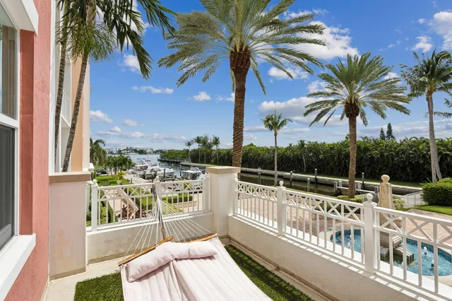 a view of balcony with furniture