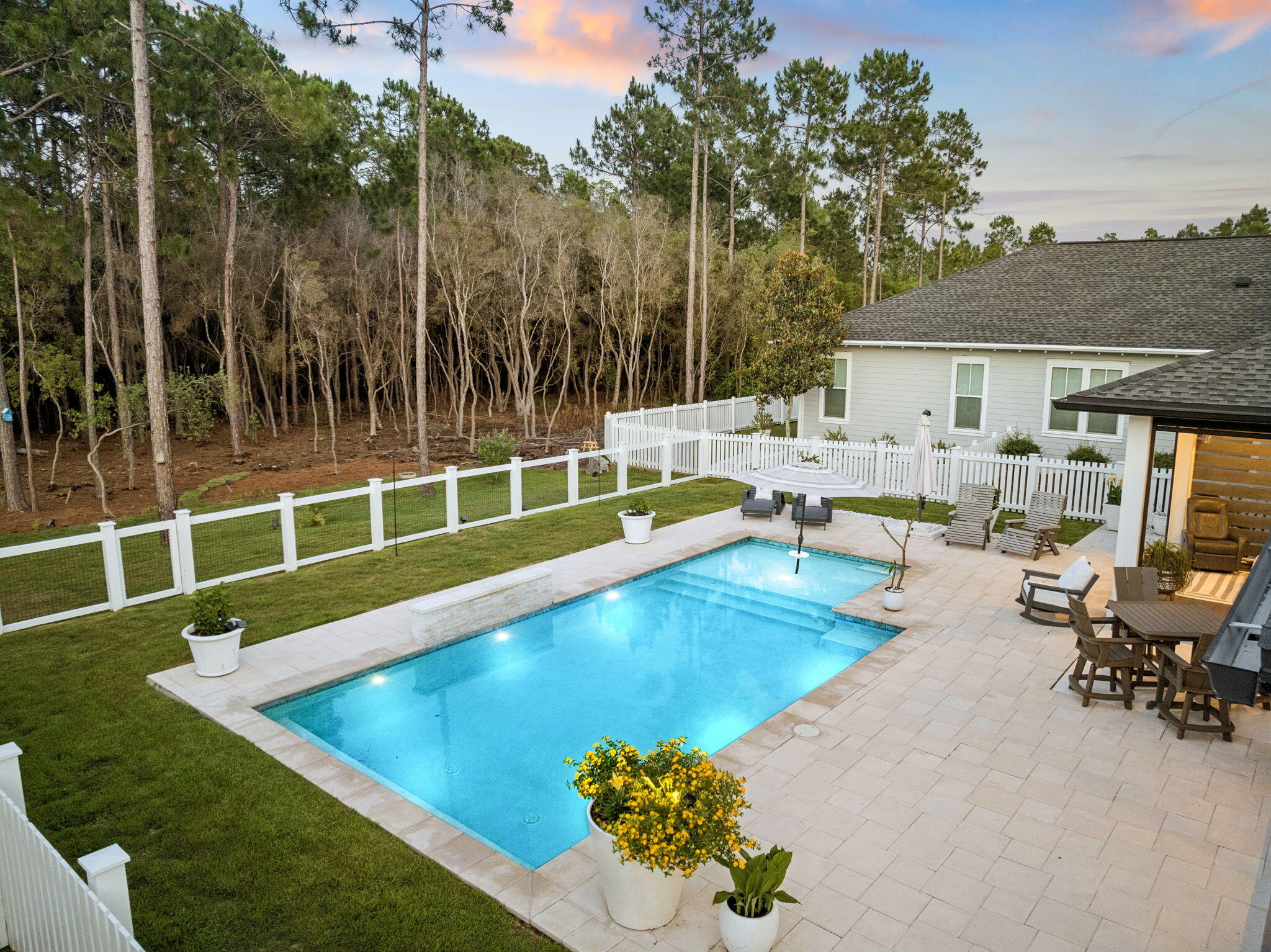 115 Log Landing St Inlet Beach Inlet Beach, FL 32461 - Photo 50 of 69 a view of a swimming pool with a patio and a garden