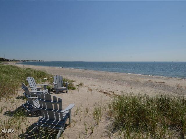a view of a lake with beach