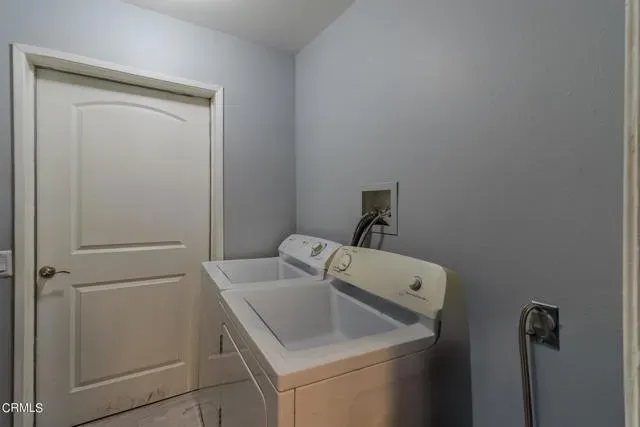 a bathroom with a toilet sink and tub