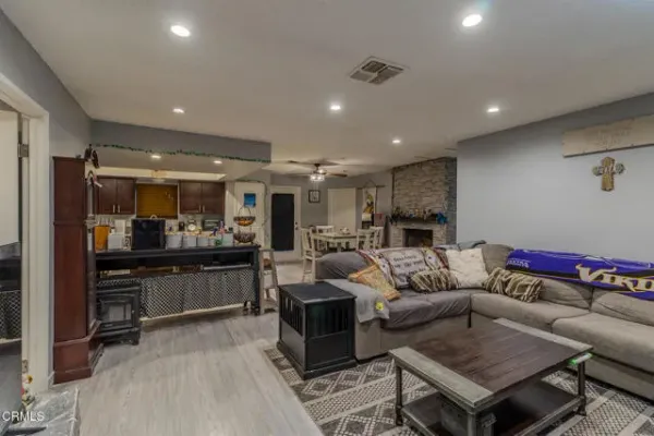 a view of a dining area with furniture and a window