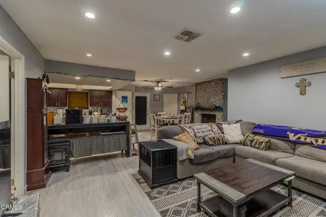 a view of a dining area with furniture and a window