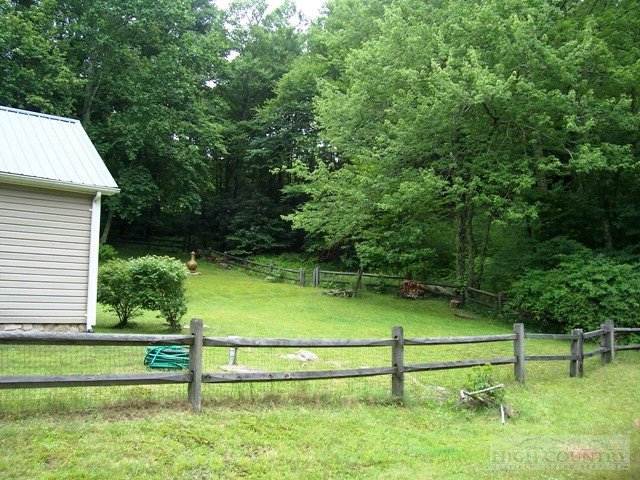 105 Misty Ridge Road Millers Creek, NC 28651 - Photo 11 of 18 a view of outdoor space and yard