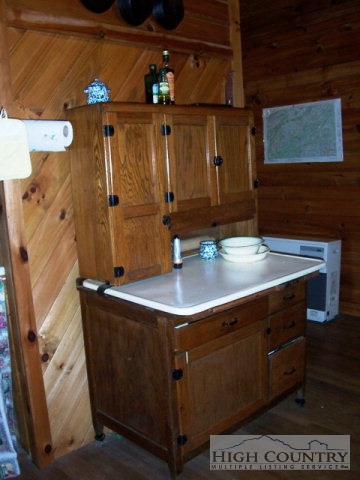 105 Misty Ridge Road Millers Creek, NC 28651 - Photo 5 of 18 a bathroom with a sink a mirror and shower