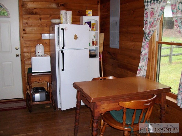 105 Misty Ridge Road Millers Creek, NC 28651 - Photo 6 of 18 a room with furniture and a fireplace