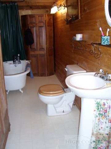 105 Misty Ridge Road Millers Creek, NC 28651 - Photo 8 of 18 a bathroom with a sink toilet and shower