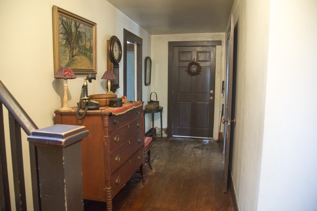 156 Green Road Bolton, MA 01740 - Photo 7 of 23 a room with a door and a table