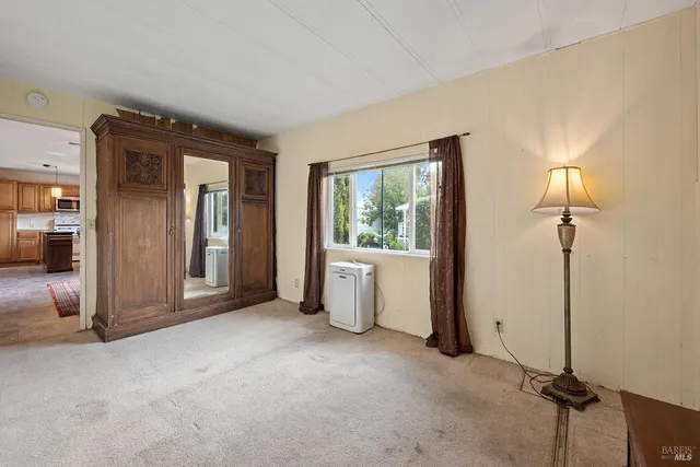 a bathroom with a sink a vanity and a mirror